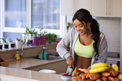 woman-cutting-fruit